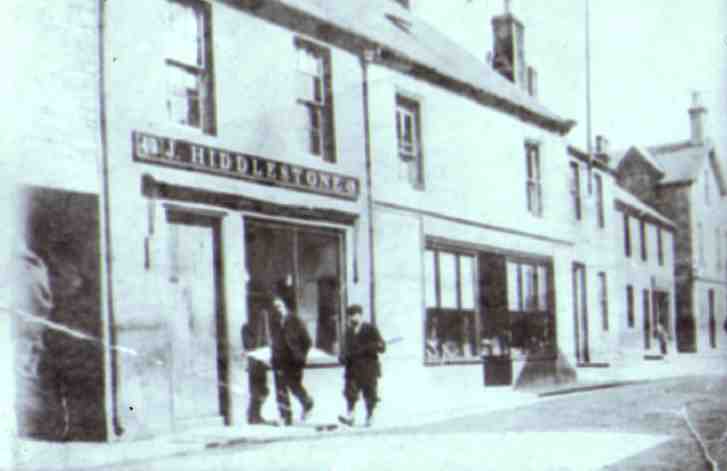 Langholm High Street circa 1890, these two properties are now Latimer's furniture and hardware store